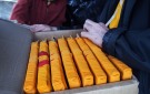 Inserting the Kangyur, the 102 volumes of the Buddha's words