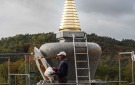 Uncovering of the finished stupa